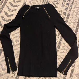 Black sweater with gold zippers